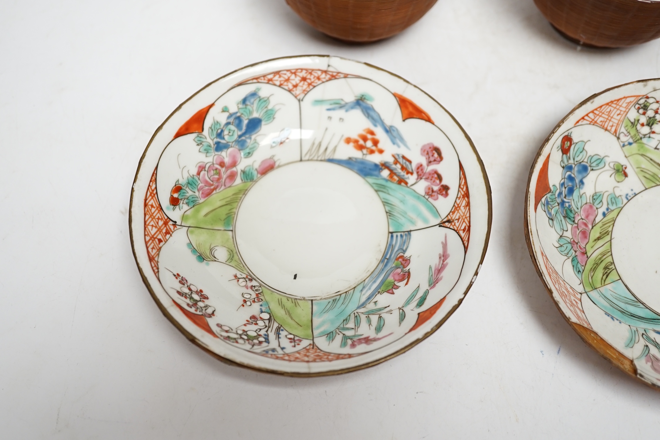 Two pairs of Japanese bamboo bound tea bowls and saucers. Condition - fair